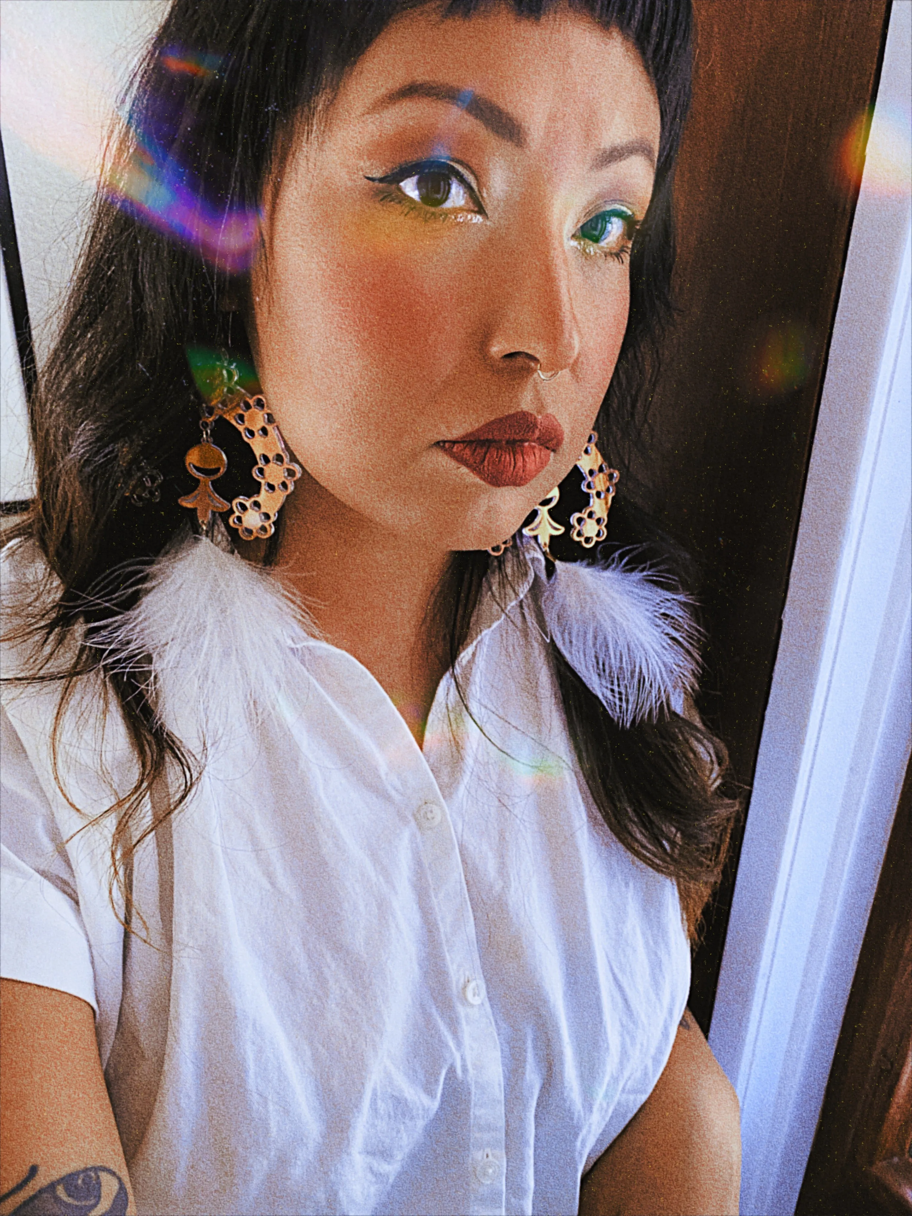 Daisy Naja With Feathers